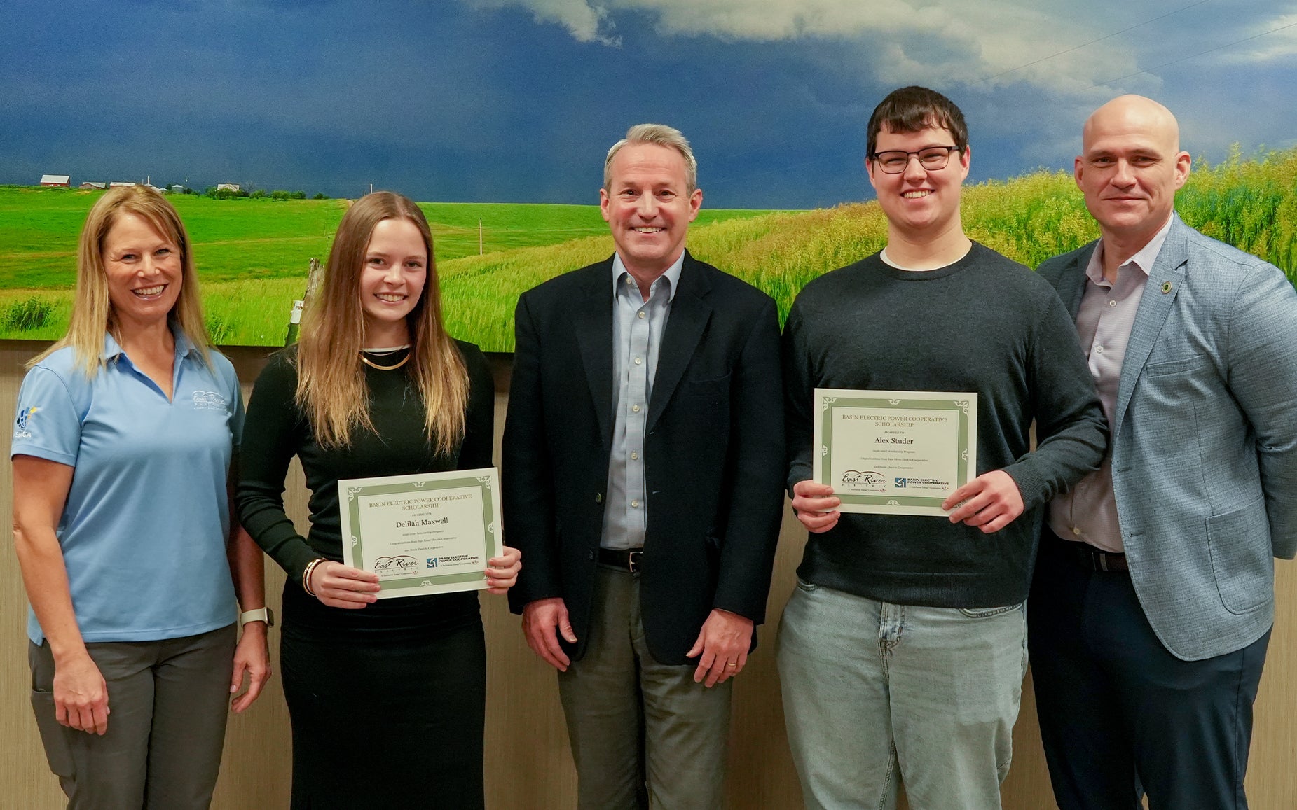 Basin Scholarship Winners Hold Awards